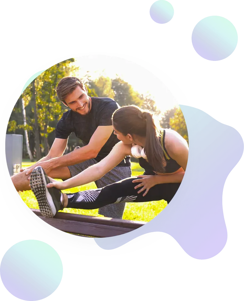 A man and woman stretch together outdoors on a sunny day, smiling and facing each other. Abstract blue and green shapes decorate the image.